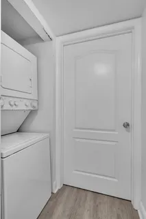 a view of building with wooden floor and windows