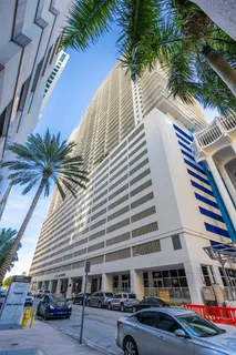 a front view of a building with glass windows