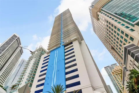 a view of a patio with table and chairs with potted plants
