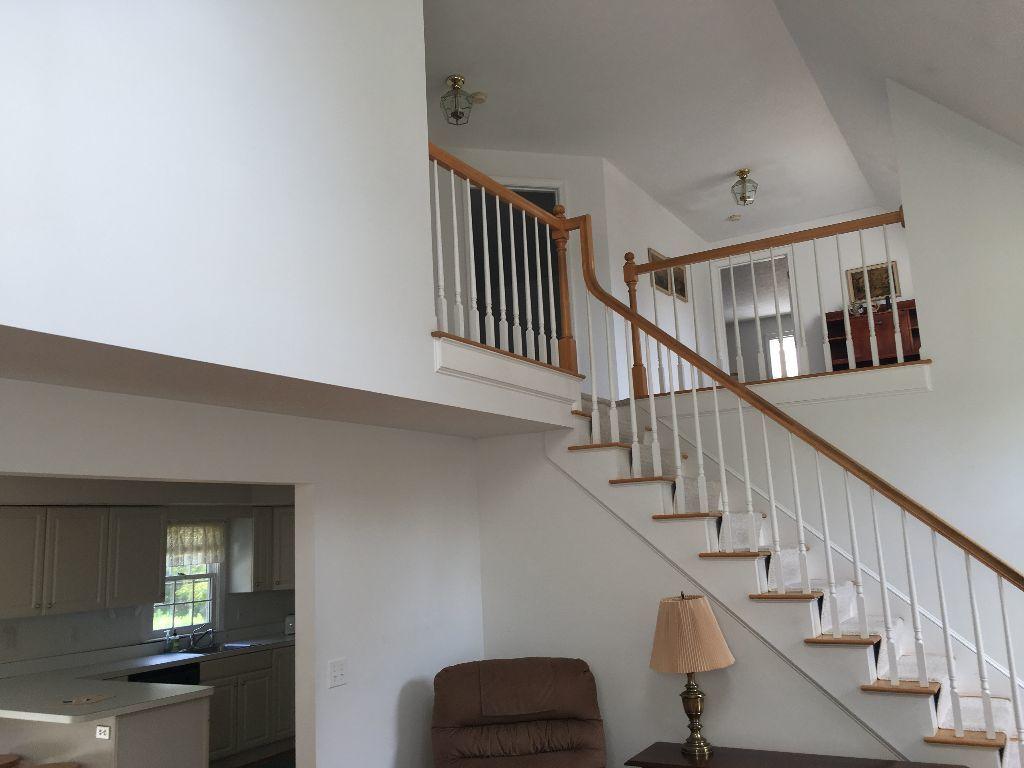 90 Meadowbrook Road Mashpee, MA 02649 - Photo 26 of 32 a view of entryway and hall with wooden floor