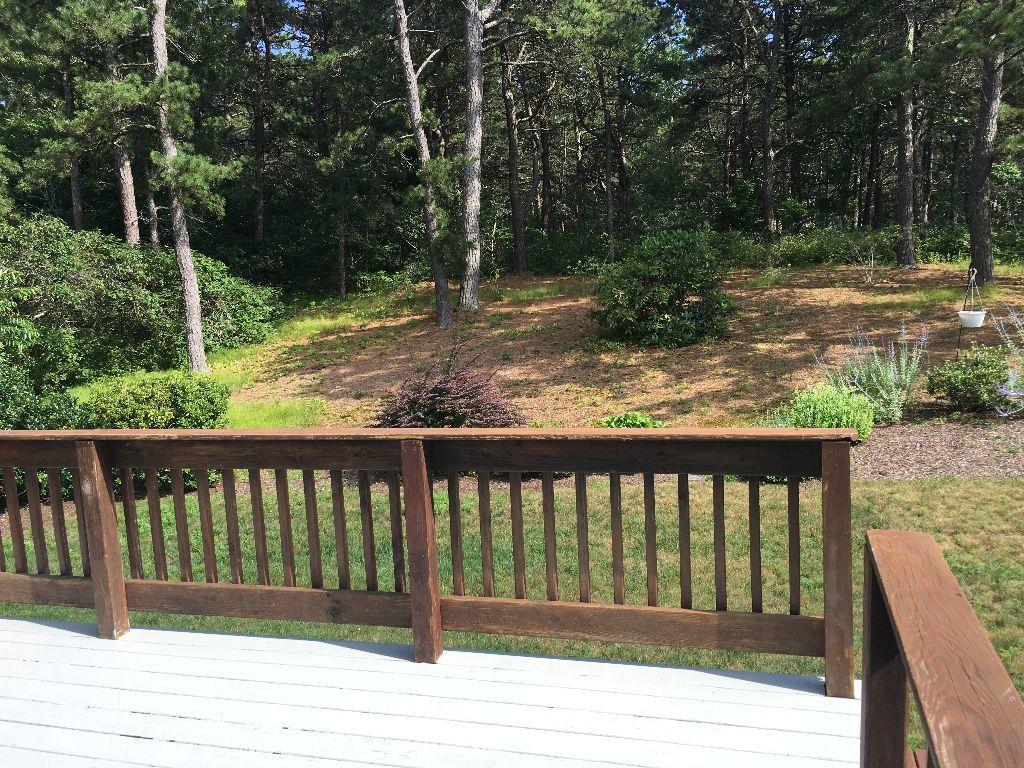 90 Meadowbrook Road Mashpee, MA 02649 - Photo 29 of 32 a view of a wooden deck