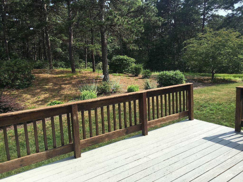 90 Meadowbrook Road Mashpee, MA 02649 - Photo 4 of 32 a balcony with wooden floor and outdoor space