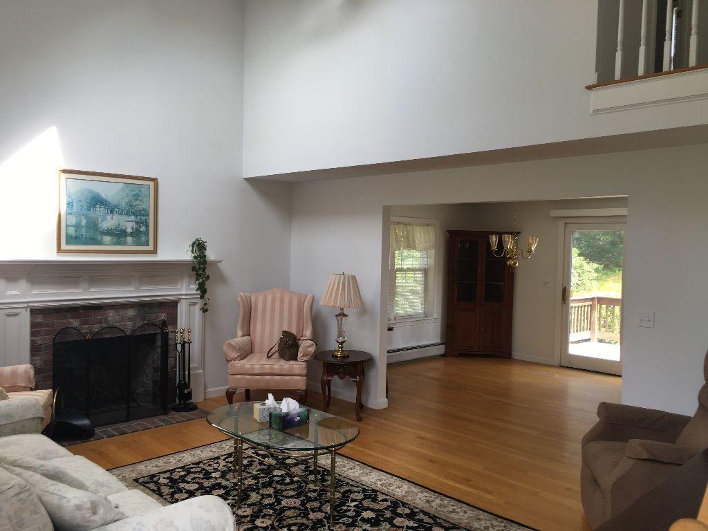 90 Meadowbrook Road Mashpee, MA 02649 - Photo 8 of 32 a living room with furniture rug and fireplace