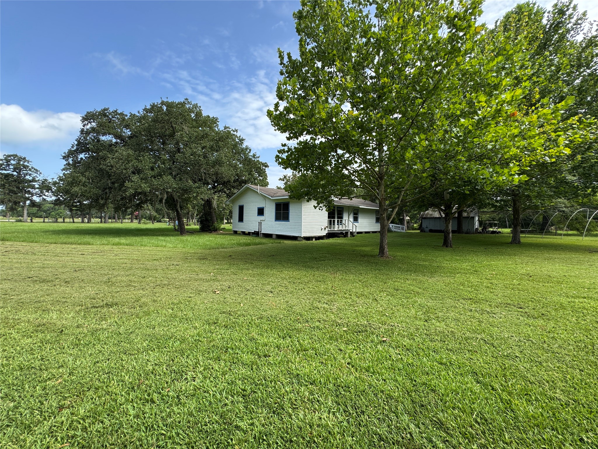 2300 Bowler Road Waller, TX 77484 - Photo 33 of 34 a view of a house with a big yard