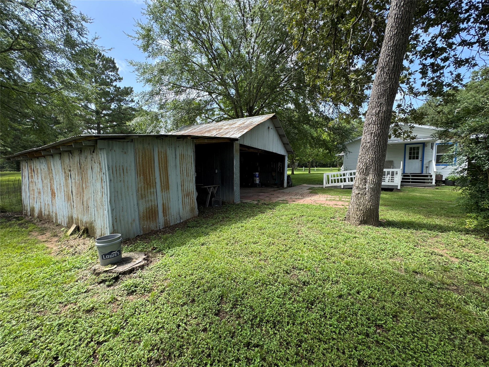 2300 Bowler Road Waller, TX 77484 - Photo 5 of 34 a view of a backyard with a tree