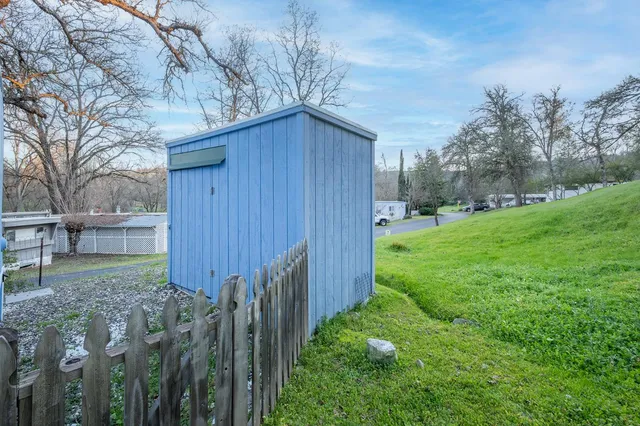 a backyard of a house with lots of green space