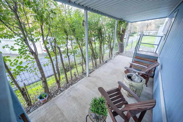 a view of a porch with furniture