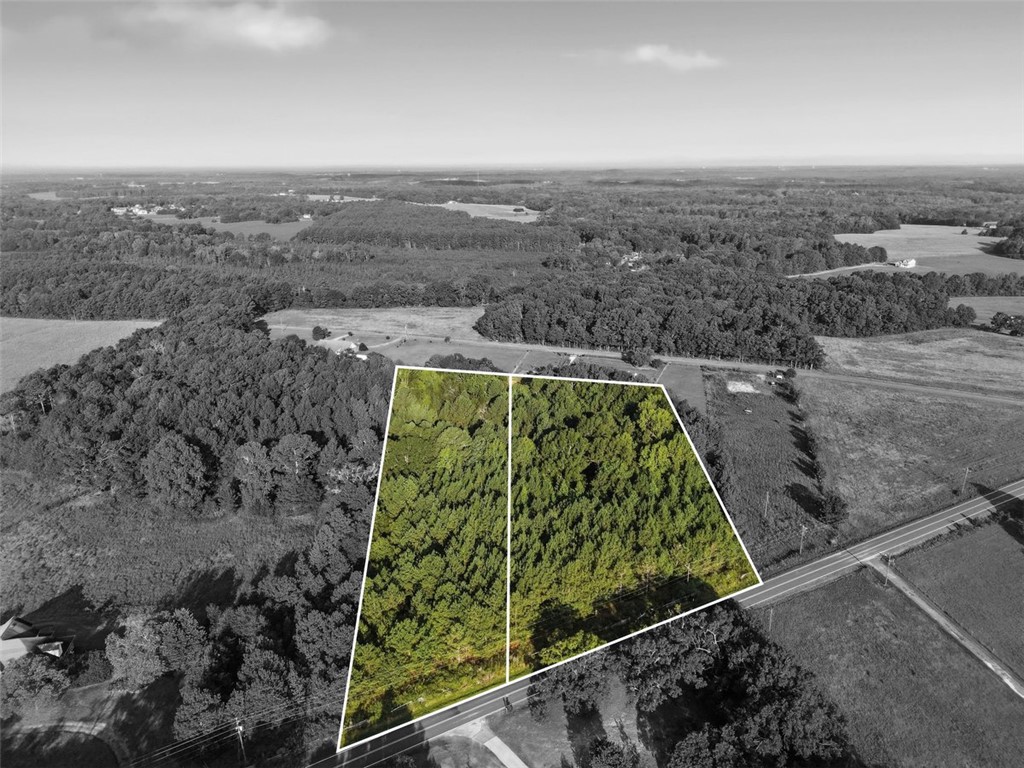 Five Five Forks Road Pendleton, SC 29670 - Photo 7 of 15 Lush mature trees blanket these expansive parcels bordered by a quiet country road.