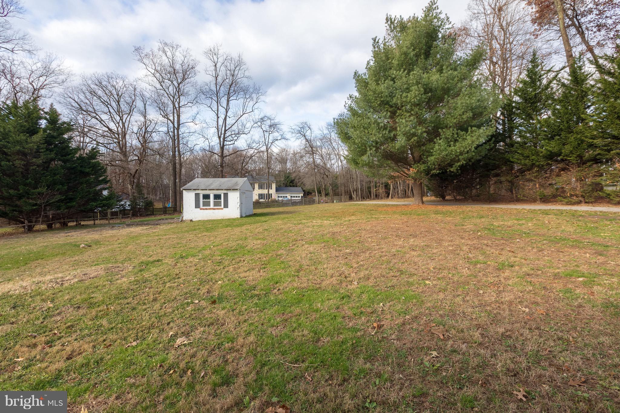 15414 Peach Orchard Road Silver Spring, MD 20905 - Photo 17 of 19 a view of a field with trees