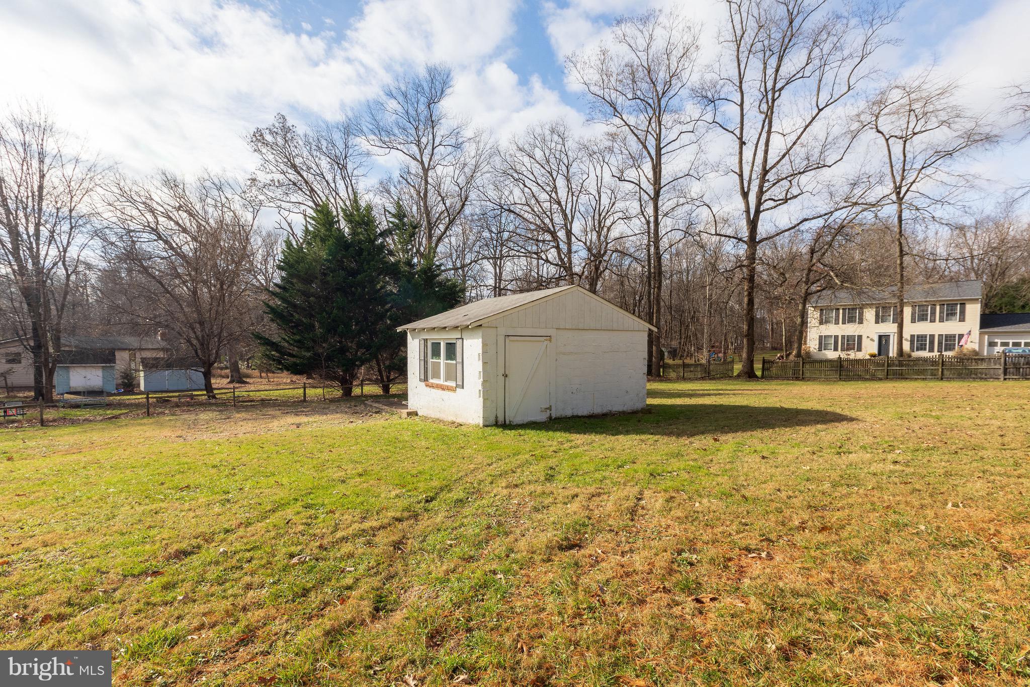 15414 Peach Orchard Road Silver Spring, MD 20905 - Photo 18 of 19 a house view with swimming pool in front of house