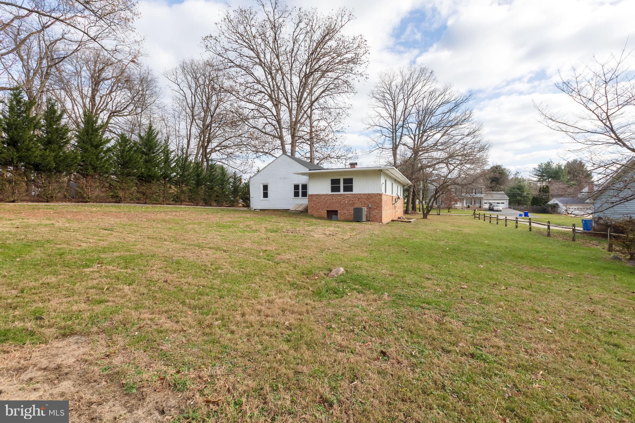 15414 Peach Orchard Road Silver Spring, MD 20905 - Photo 19 of 19 a view of a field with tree in the background