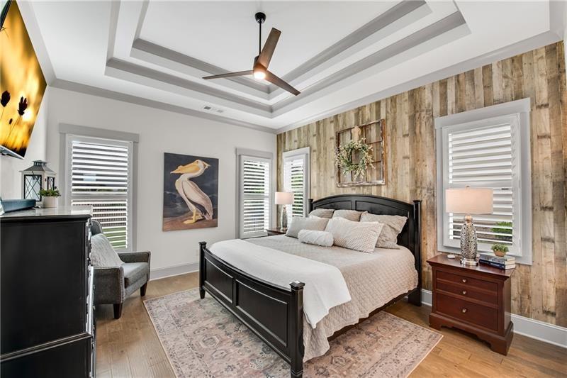 485 Delaperriere Loop Jefferson, GA 30549 - Photo 27 of 71 a bedroom with a large bed and a window