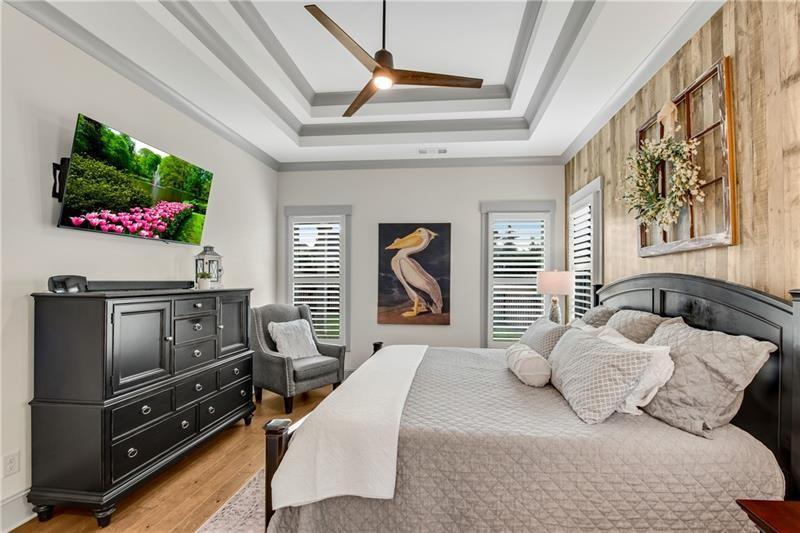 485 Delaperriere Loop Jefferson, GA 30549 - Photo 28 of 71 a bedroom with furniture and flat screen tv