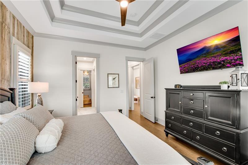 485 Delaperriere Loop Jefferson, GA 30549 - Photo 29 of 71 a bedroom with a bed and a flat screen tv