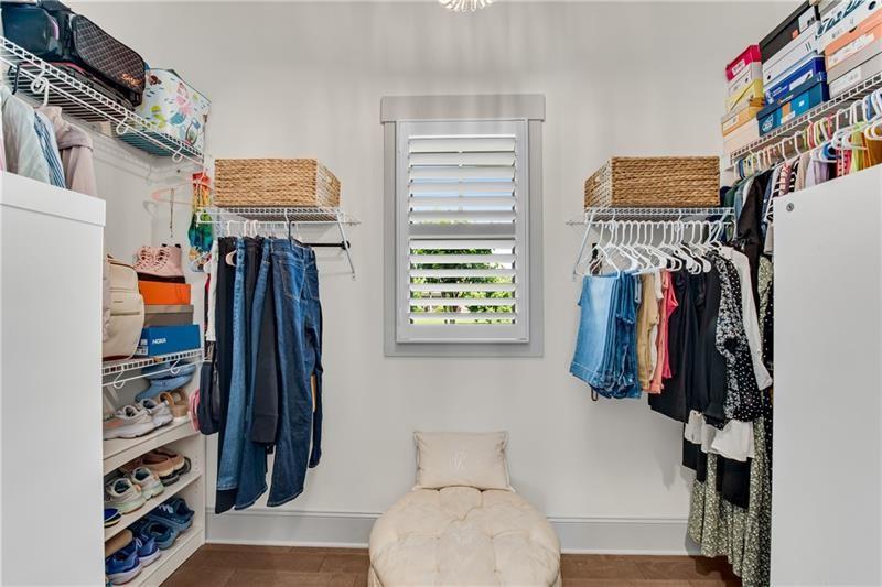 485 Delaperriere Loop Jefferson, GA 30549 - Photo 34 of 71 a view of walk in closet with clothes and shoes