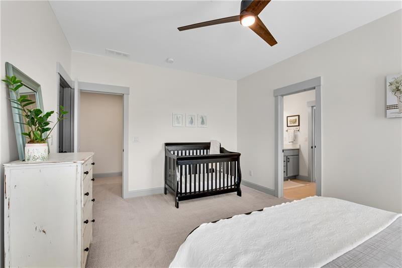 485 Delaperriere Loop Jefferson, GA 30549 - Photo 40 of 71 a bedroom with a bed and a window