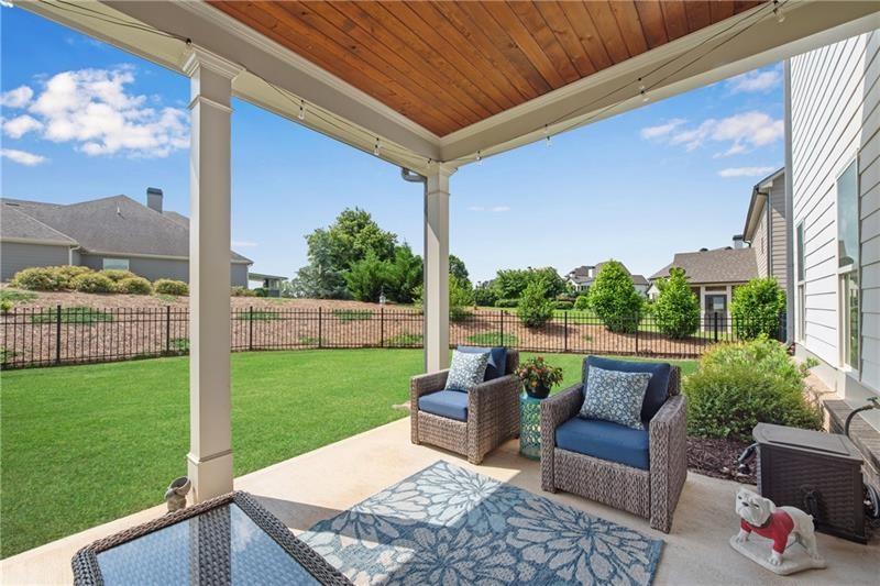 485 Delaperriere Loop Jefferson, GA 30549 - Photo 53 of 71 a view of a patio with couches chairs potted plants and a yard