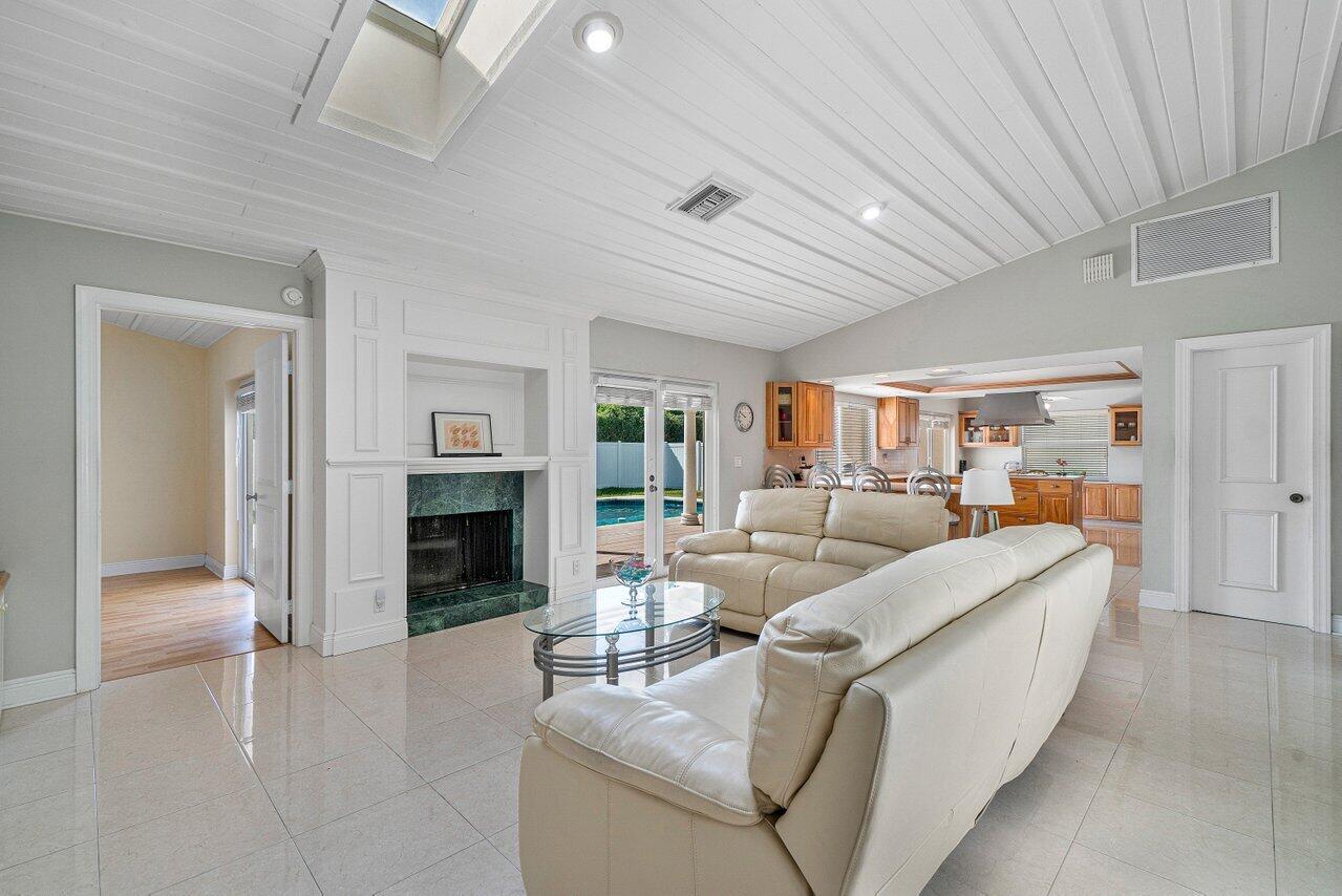 1514 Southwest 6th Terrace Boca Raton, FL 33486 - Photo 15 of 32 FAMILY ROOM OPENING TO KITCHEN