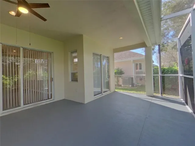 a view of livingroom with furniture and floor to ceiling window