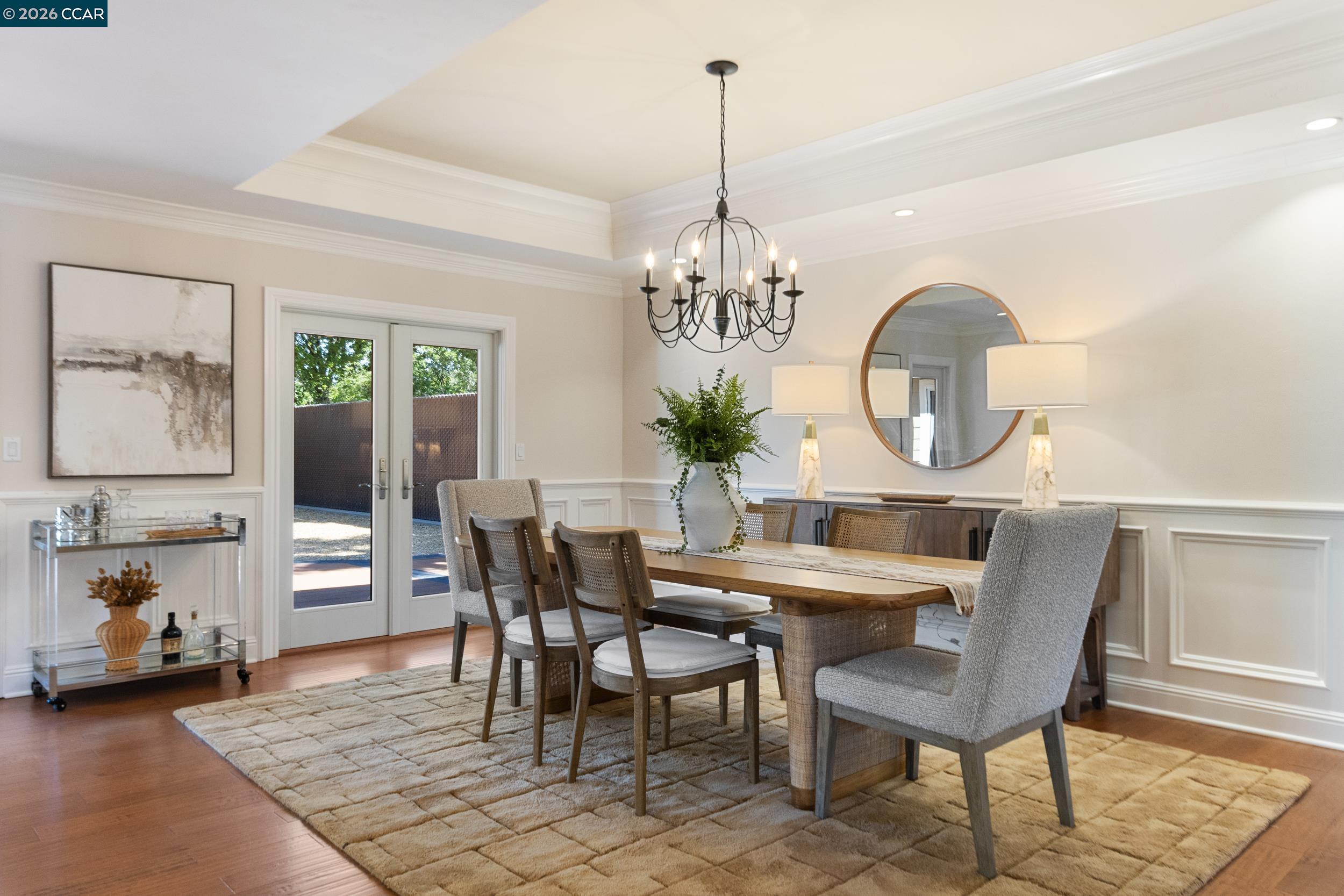 484 Diablo Road Danville, CA 94526 - Photo 10 of 39 a view of a dining room with furniture and chandelier