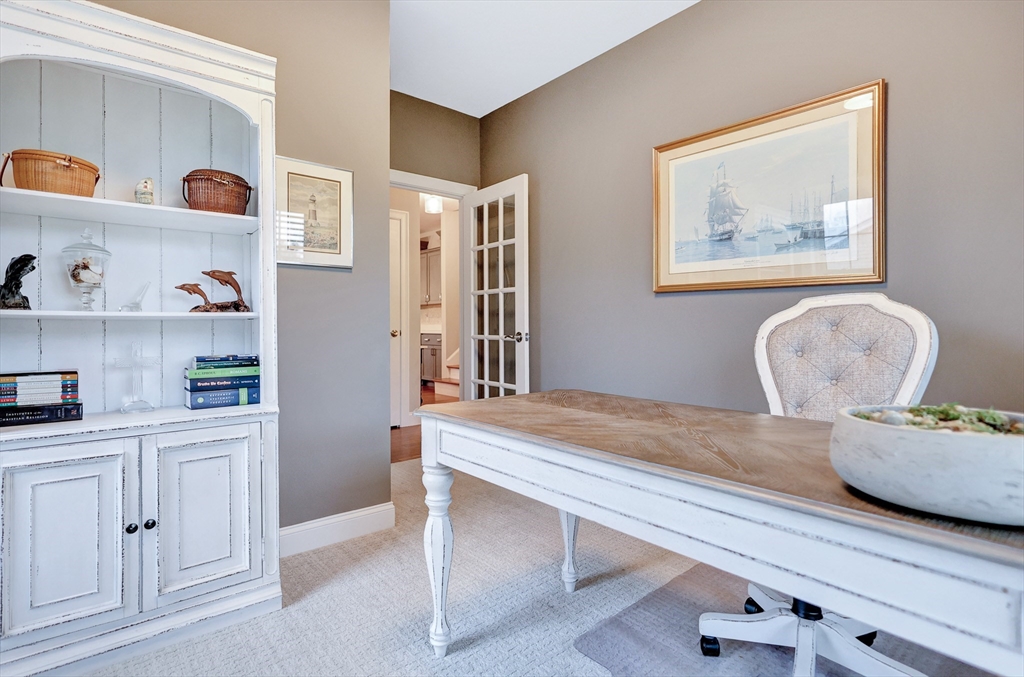 24 Del Ray Drive, Unit 25 Windham, NH 03087 - Photo 18 of 30 a room with furniture and wooden floor