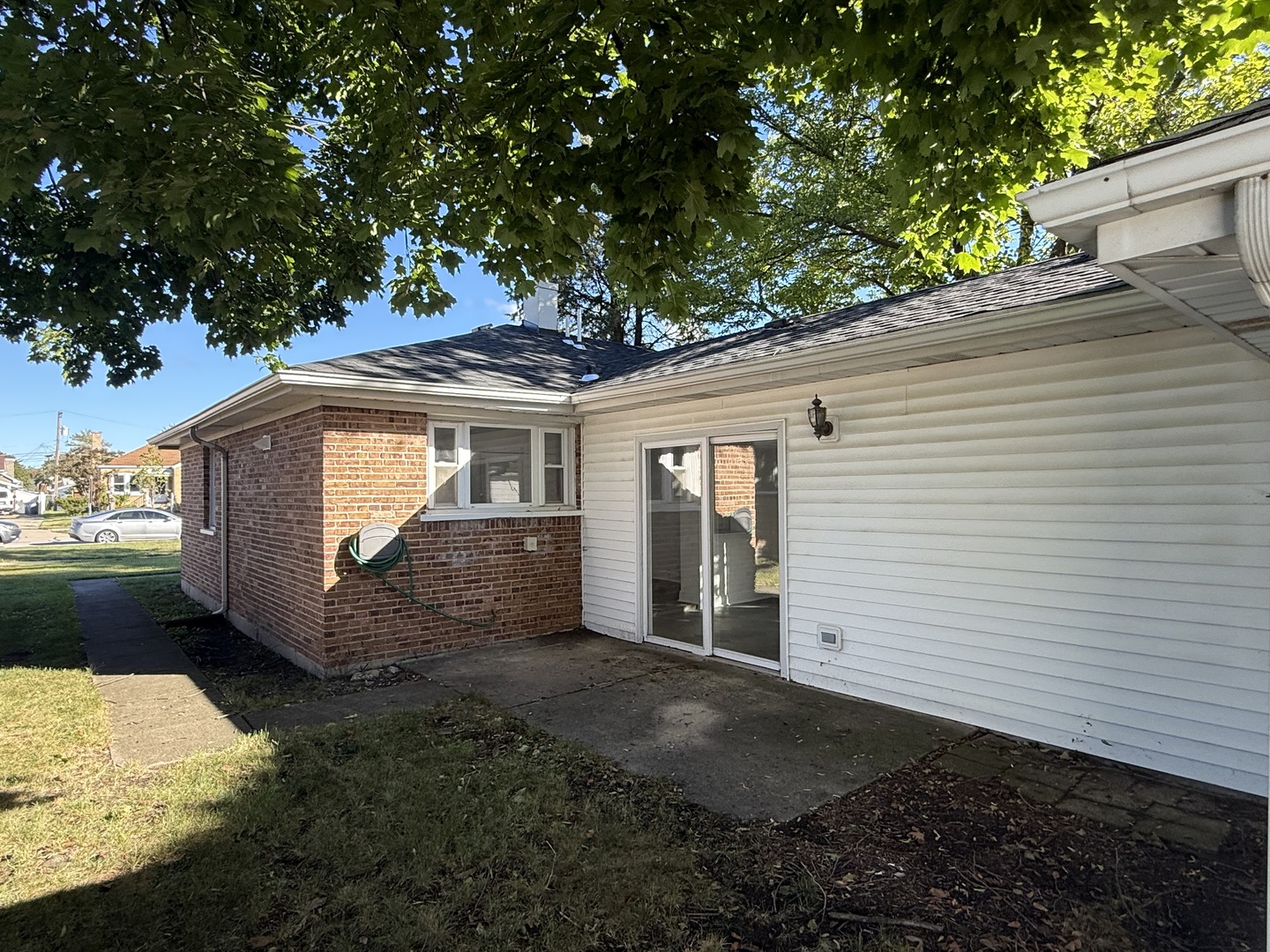881 East Thacker Street Des Plaines, IL 60016 - Photo 15 of 17 a view of a house with a yard