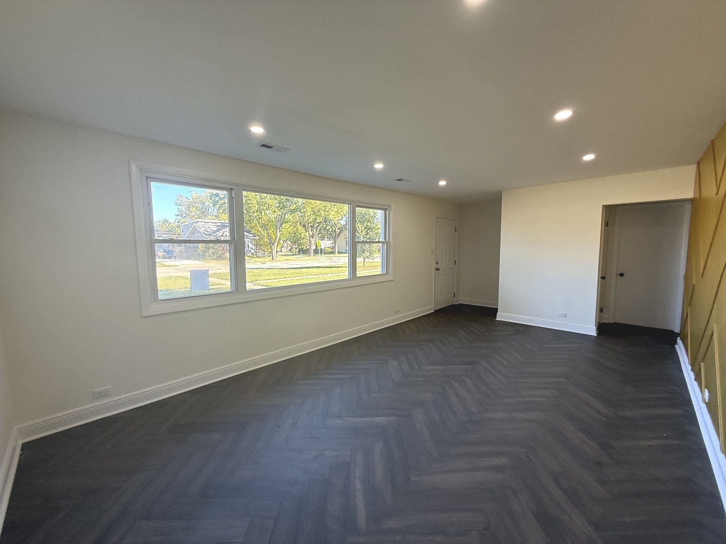 881 East Thacker Street Des Plaines, IL 60016 - Photo 2 of 17 a view of an empty room with a window