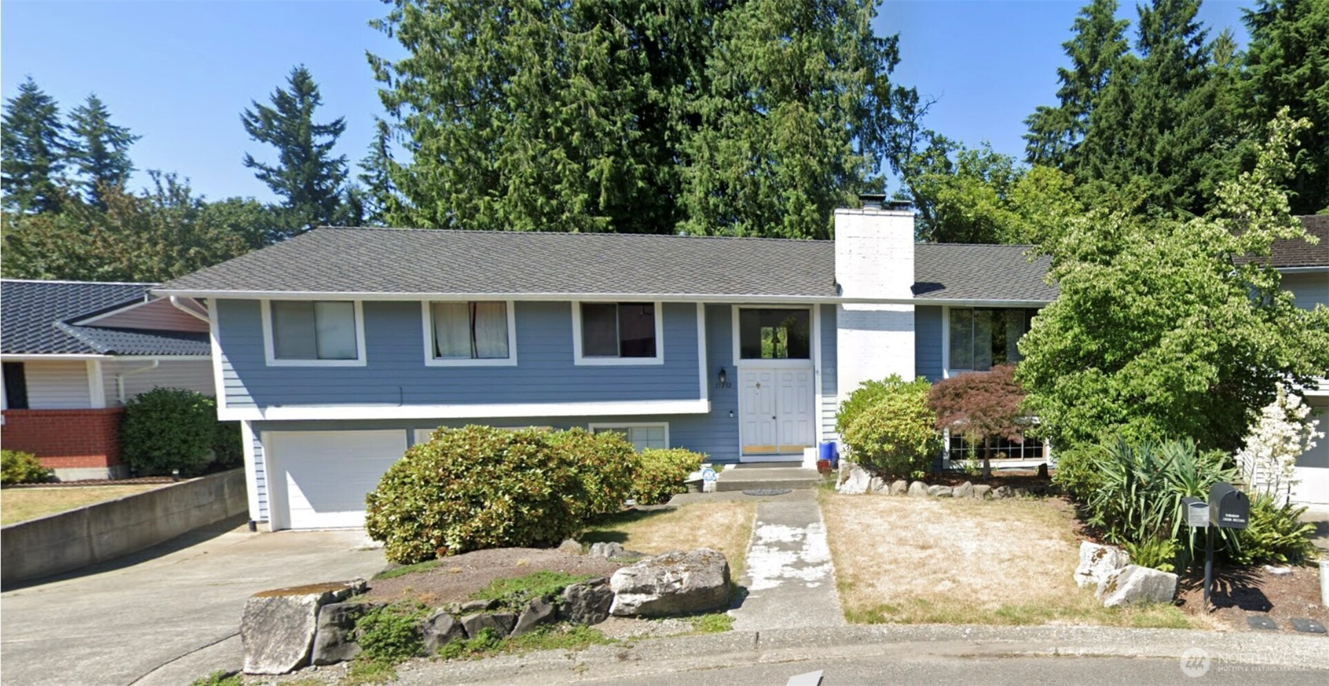 15252 Southeast 171st Place Renton, WA 98058 - Photo 1 of 1 a front view of a house with a yard