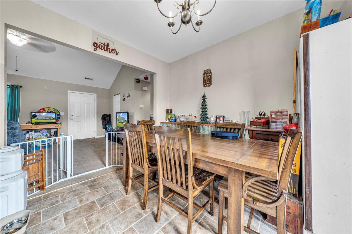 563 Kemp Ford Road Union Hall, VA 24176 - Photo 13 of 38 a view of a dining room with furniture
