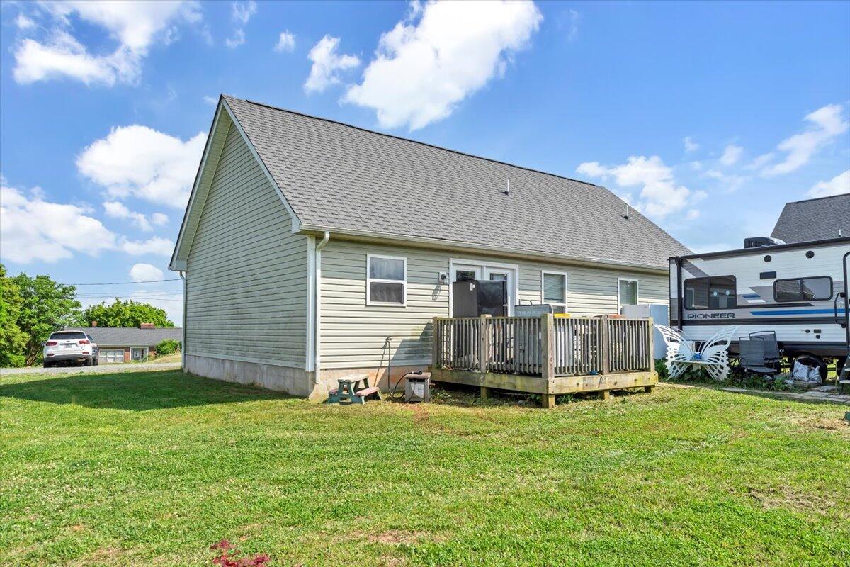 563 Kemp Ford Road Union Hall, VA 24176 - Photo 26 of 38 a view of a house with a backyard