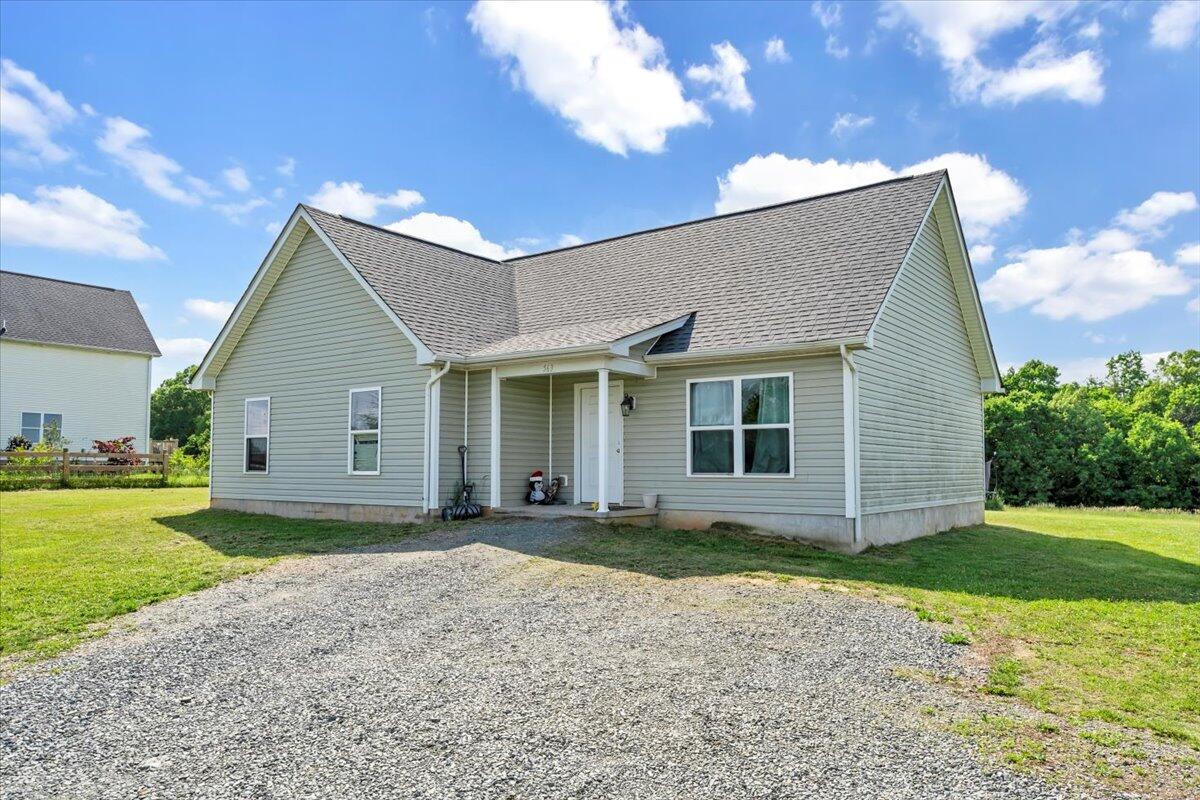 563 Kemp Ford Road Union Hall, VA 24176 - Photo 37 of 38 a view of a house with yard and a garden