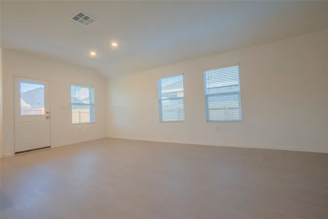 a view of a kitchen with a kitchen and windows