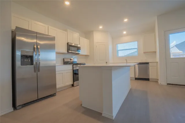 an empty room with windows