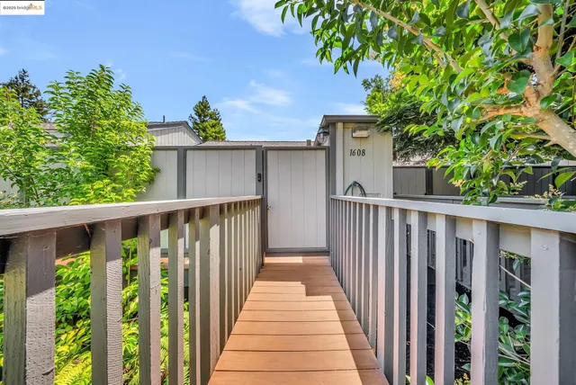 a view of a wooden fence