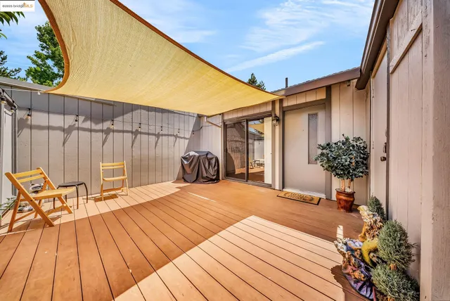 a bedroom with a bed and a table