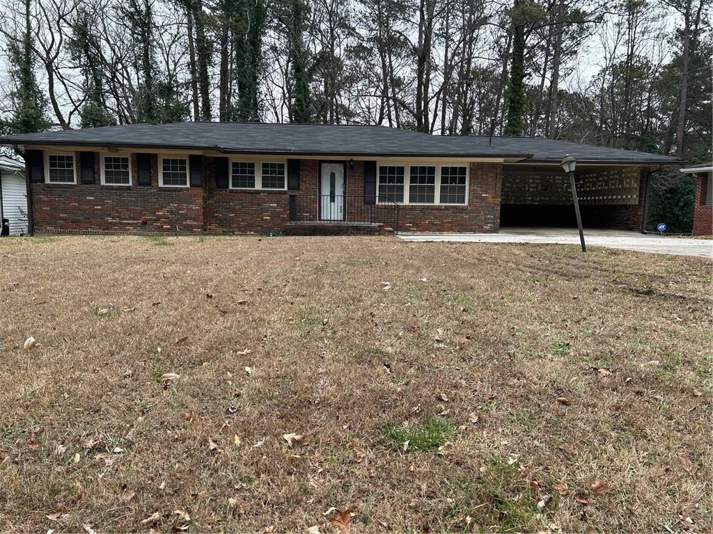 front view of house with a yard