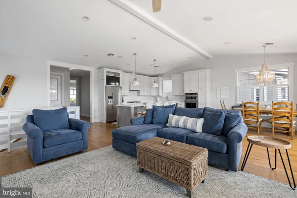 a bathroom with a double vanity sink mirror and shower