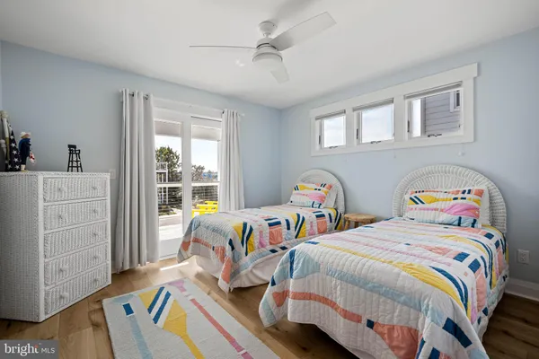 an aerial view of a house with a lake view