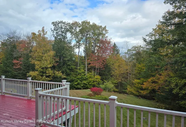 a view of a balcony with an outdoor space