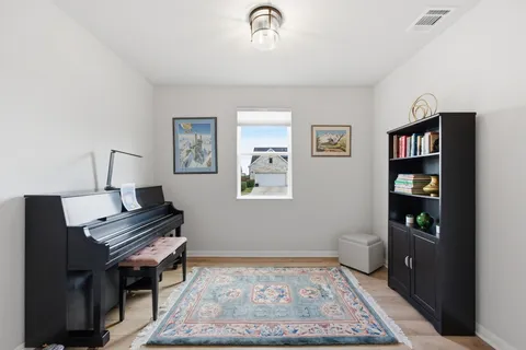 a kitchen with a sink a stove cabinets and counter space