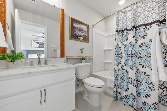 a en suite spacious bathroom with a shower and a tub