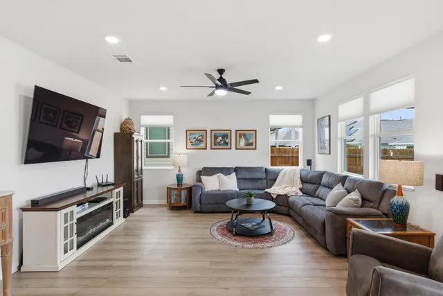 a view of house with outdoor space and swimming pool