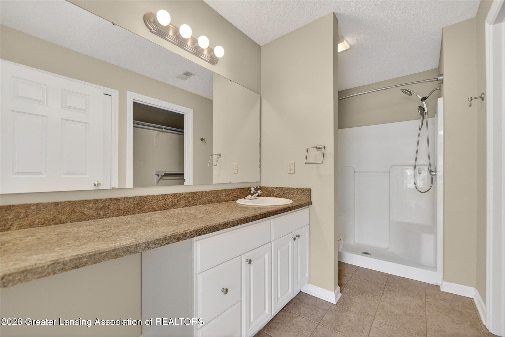 1337 Coolidge Road, Unit 16 East Lansing, MI 48823 - Photo 19 of 31 19-1337-Coolidge-Rd-WindowStill