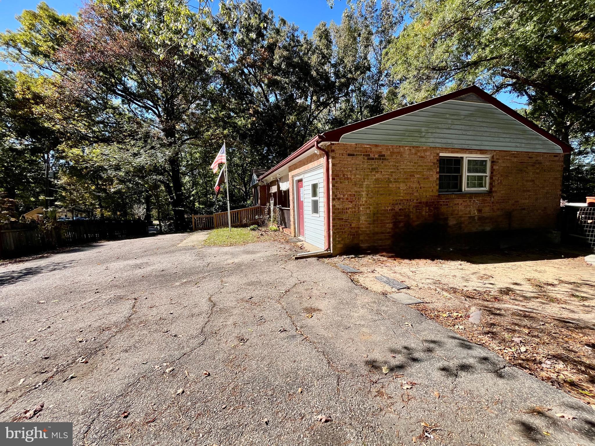 4302 Baxter Road Prince George, VA 23875 - Photo 23 of 78 a front view of a house with a yard