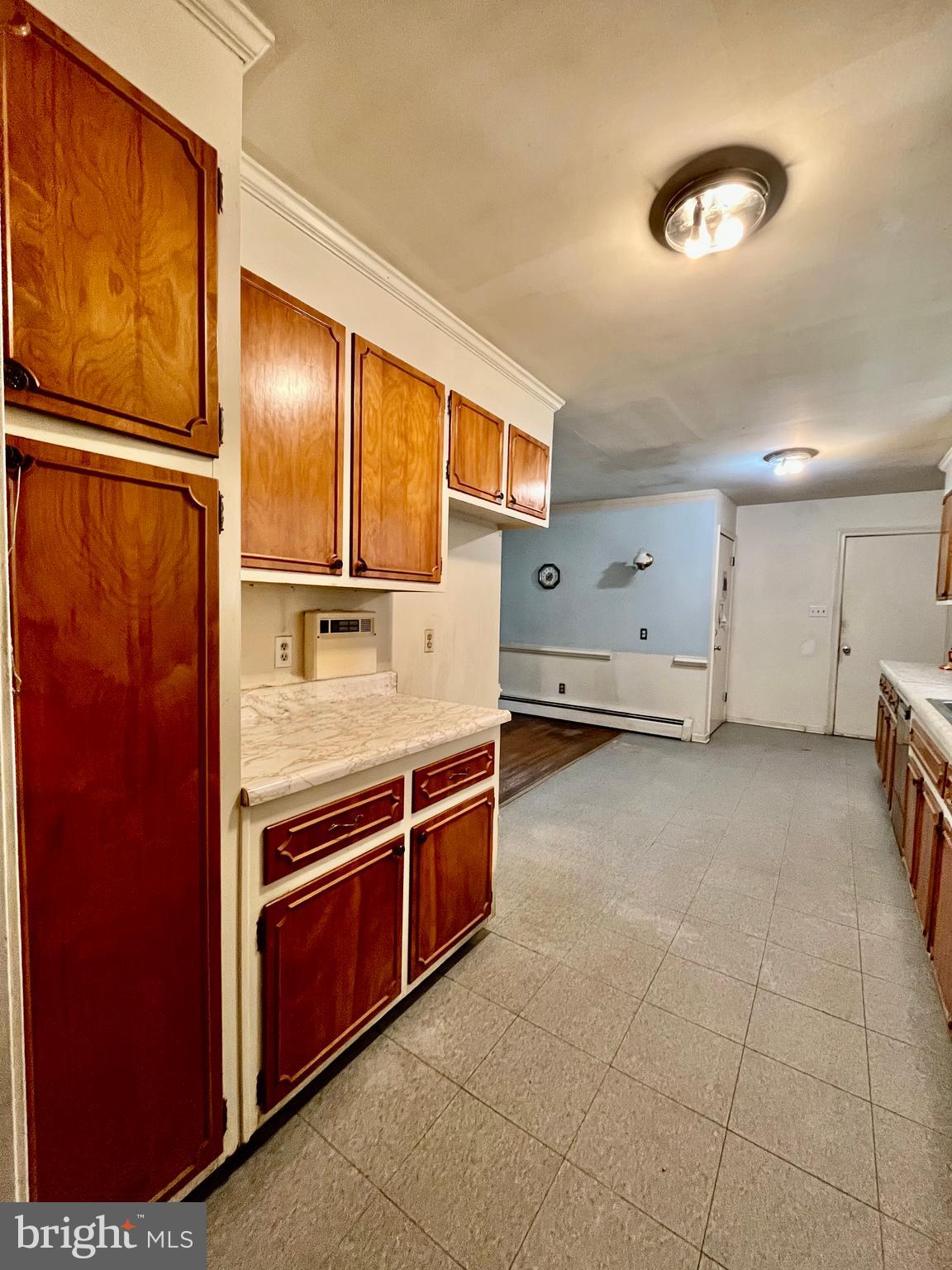 4302 Baxter Road Prince George, VA 23875 - Photo 27 of 78 a kitchen with stainless steel appliances granite countertop a stove and a refrigerator