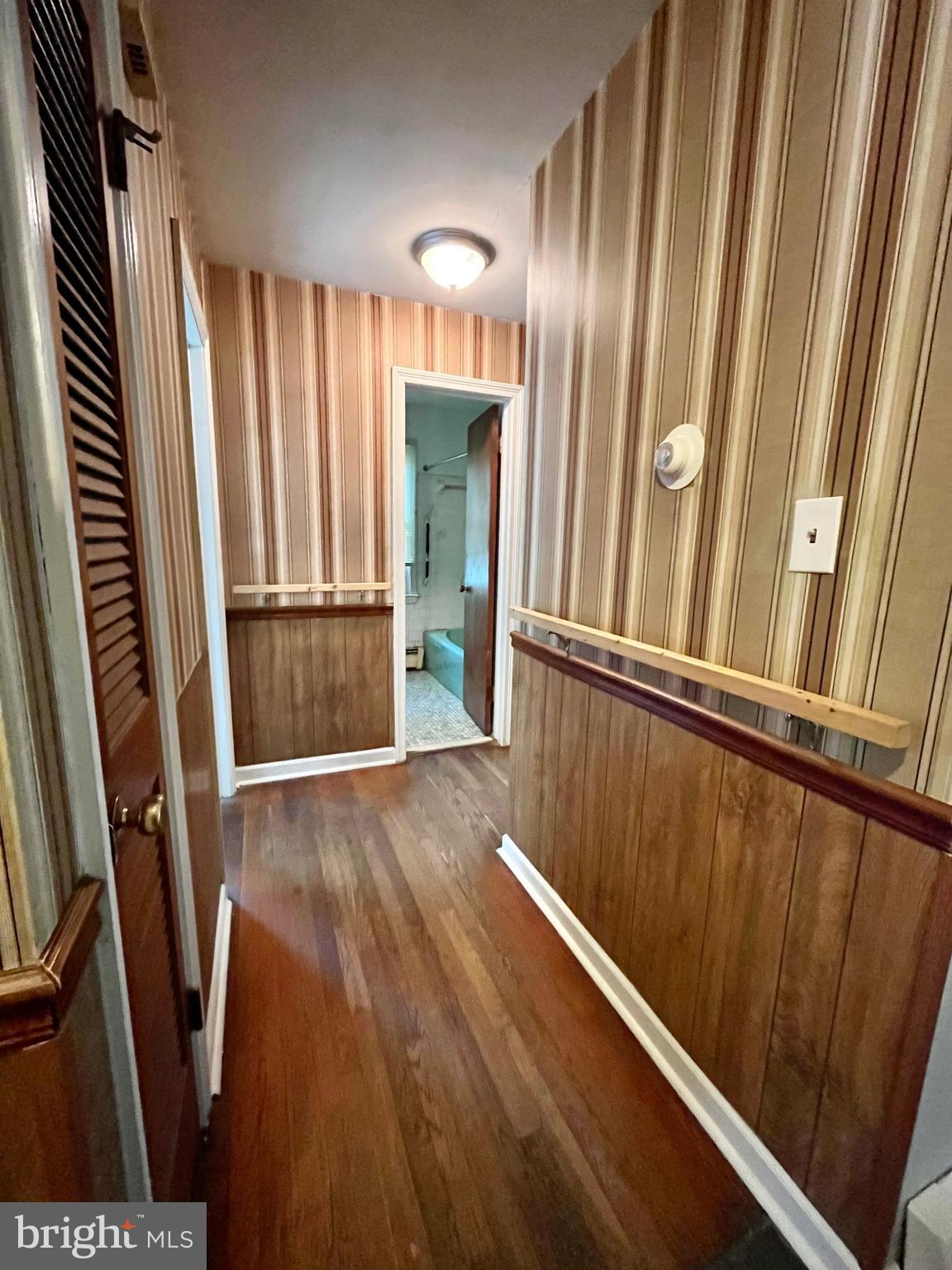 4302 Baxter Road Prince George, VA 23875 - Photo 45 of 78 a view of an empty room with wooden floor