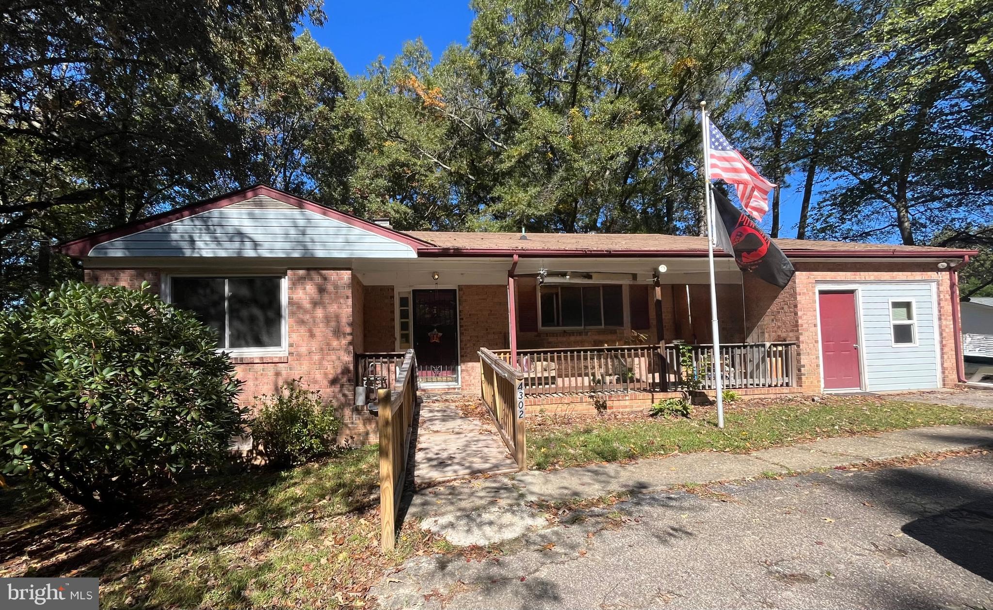 4302 Baxter Road Prince George, VA 23875 - Photo 78 of 78 a front view of a house with patio