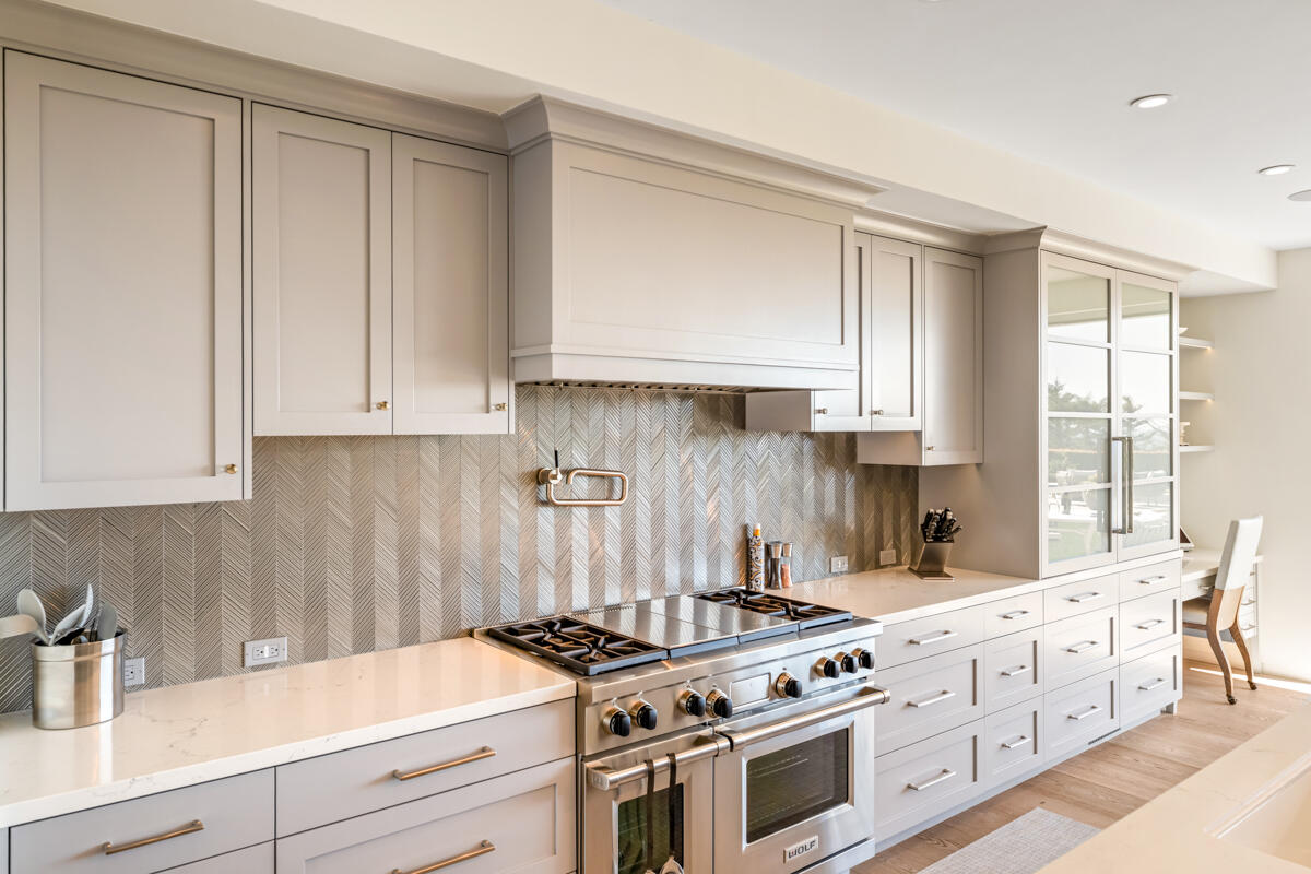 1850 Jelinda Drive Montecito, CA 93108 - Photo 18 of 50 a kitchen with granite countertop white cabinets and white appliances