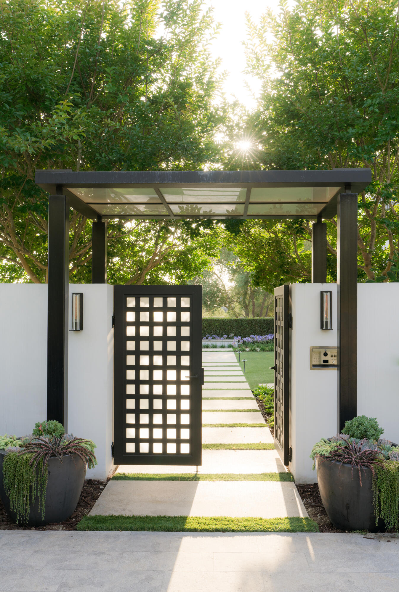 1850 Jelinda Drive Montecito, CA 93108 - Photo 3 of 50 a view of a patio with table and chairs and a barbeque with potted plants
