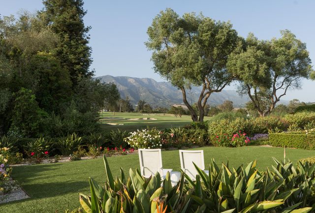 an aerial view of a house with a garden